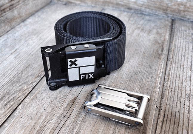 Custom belt that holds sport specific tools in the buckle for skaters, snowboarders and bike riders